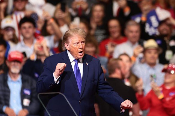 Donald Trump dances at a campaign rally in South Carolina on Thursday.