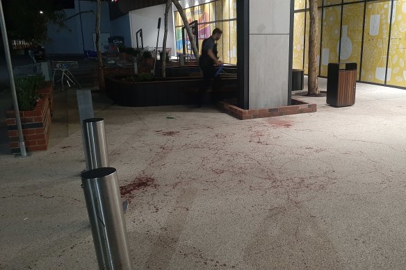 Police at the scene of the stabbing at Midland Gate Shopping Centre on Wednesday night.