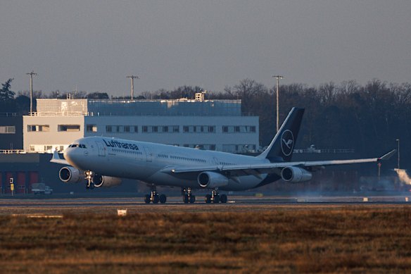 A Lufthansa plane from Muscat, Oman, the first evacuation flight on behalf of the German government,  lands at Frankfurt Airport.