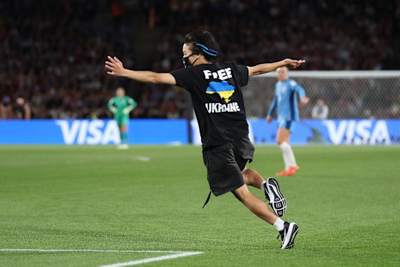 A pitch invades runs out onto the field during the World Cup final.