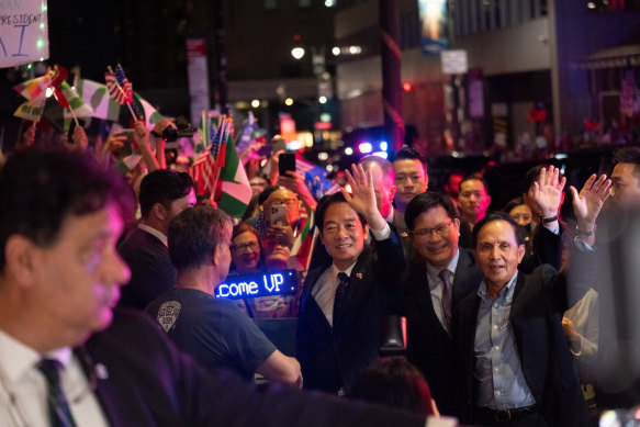 William Lai (centre) arrives at the Lotte Hotel in Manhattan in New York on Saturday.