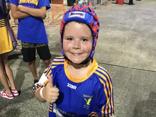 Andy Condon, 7, was glad to go home with Kalyn Ponga’s headgear.