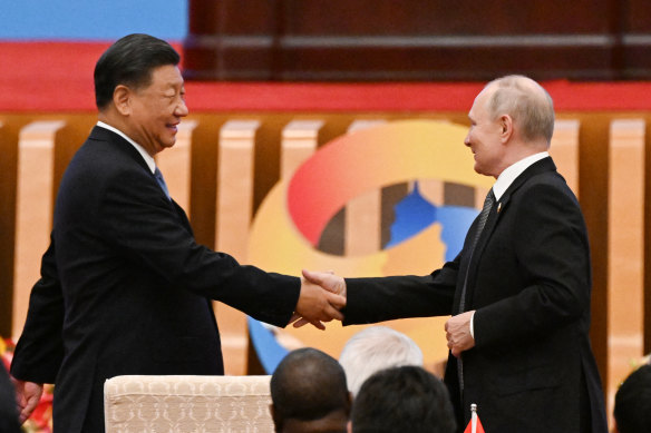 In a show of solidarity with Vladimir Putin, Xi Jinping led him into the forum at the Great Hall of the People in Beijing ahead of other leaders.