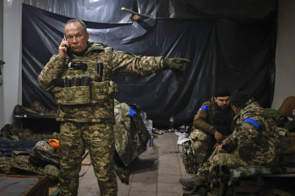 Commander of the Ukrainian army, Colonel General Oleksandr Syrskyi, gives instructions in a shelter in Soledar.