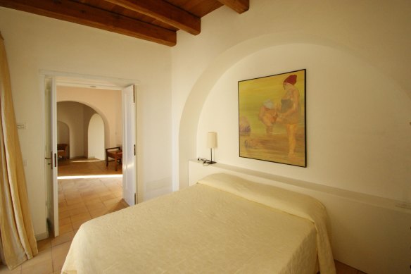 Our room is small and simply furnished, but comes with dazzling views of Ischia.