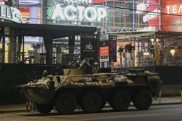 An armoured personnel carrier is seen next to a shopping mall in the southern city of Rostov-on-Don.