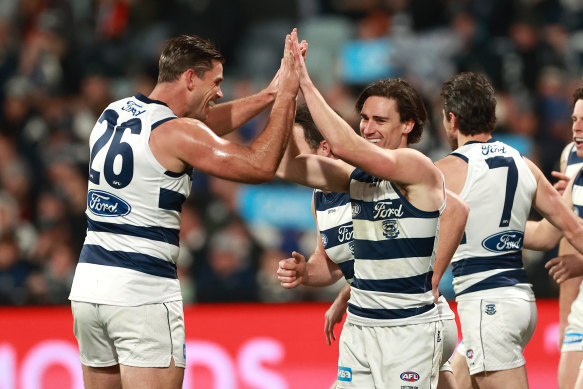 Gryan Miers of the Cats celebrates kicking a goal with Tom Hawkins of the Cats.