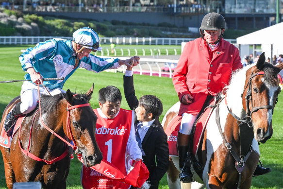 James McDonald returns to the mounting yard on Romantic Warrior.