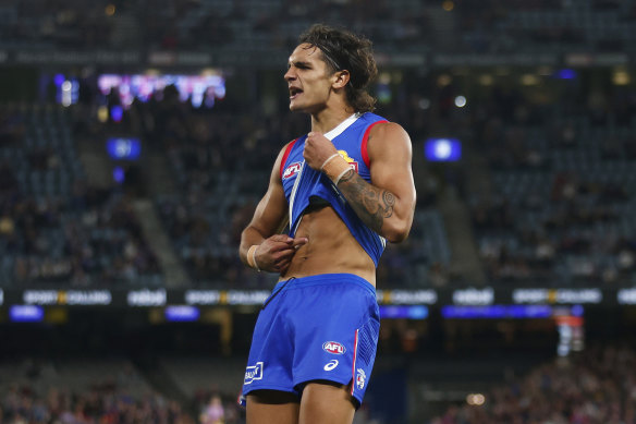 Jamarra Ugle-Hagan recreated Nicky Winmar’s famous gesture by facing the crown and pointing to his skin in a game last year.