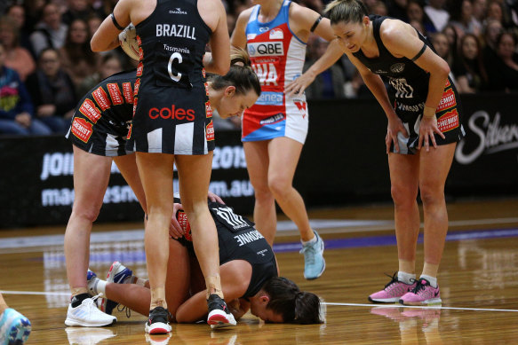 Kelsey Browne of the Magpies injured during the Round 13 Super Netball match.
