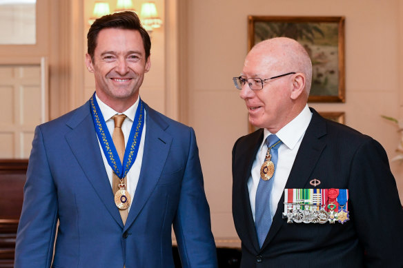 Hugh Jackman is awarded the Order of Australia by Governor-General David Hurley in 2019. 