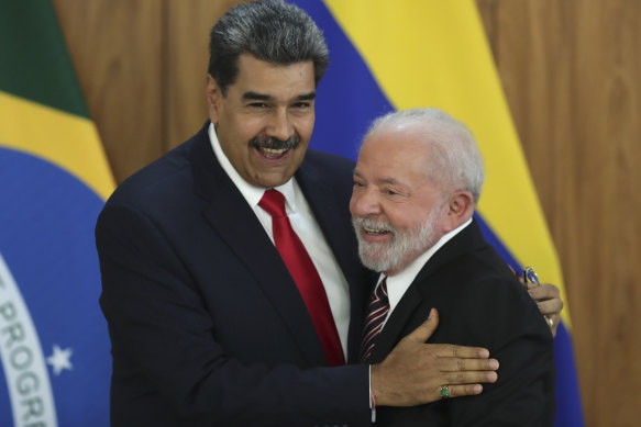 Venezuela’s President Nicolas Maduro, left, and Brazilian President Luiz Inacio Lula da Silva end a press conference at Planalto palace in Brasilia, Brazil.