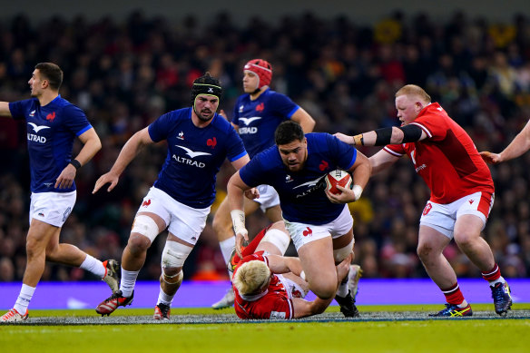 Emmanuel Mafou makes a break for France against Wales.