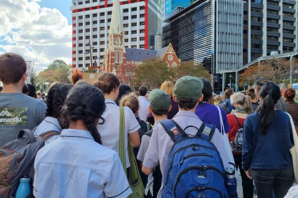 A number of school students attended the rally in uniform.