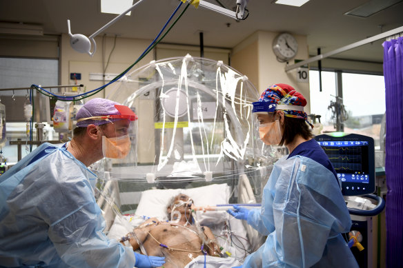 Doctors treating a patient in the ICU ward of Western Health's Footscray Hospital in Melbourne.