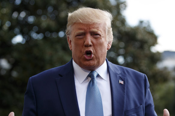 US President Donald Trump goes on the attack while talking to reporters on the South Lawn of the White House on Friday.