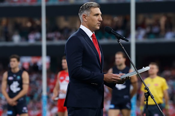Sydney chief executive Matthew Pavlich leads a pre-game tribute earlier this month to the victims of the Bondi terror attack.