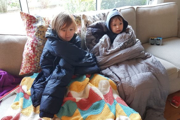 The Nunns’ children had to bundle up in their sleeping bags to keep warm in the old weatherboard home that lacked insulation.