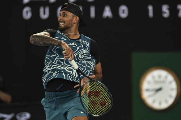 Nick Kyrgios lets fly during his practice match against Novak Djokovic  on Friday night.