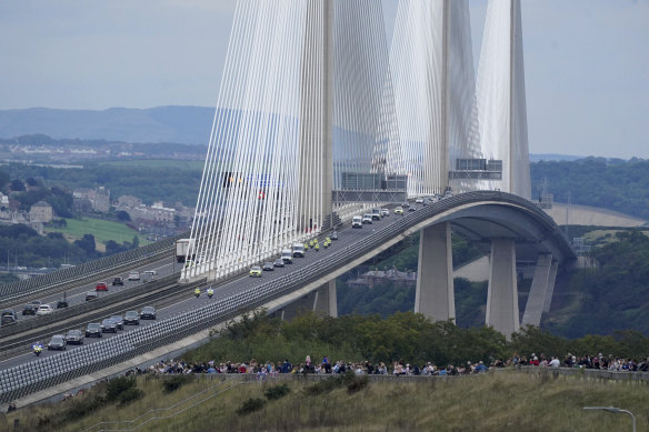 The hearse carrying the coffin of Queen Elizabeth II crosses the Forth Road Bridge before arriving in Edinburgh.