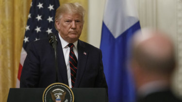 Donald Trump says Wall Street's two-day retreat is because of the move to impeach him.