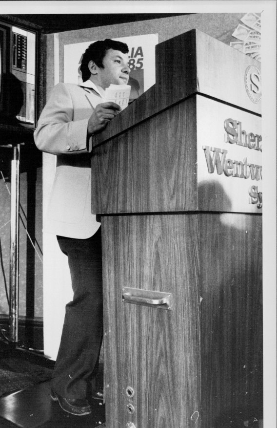 Coffa struggles to see over the lecturn at the inaugural Australia Games press conference in 1985.