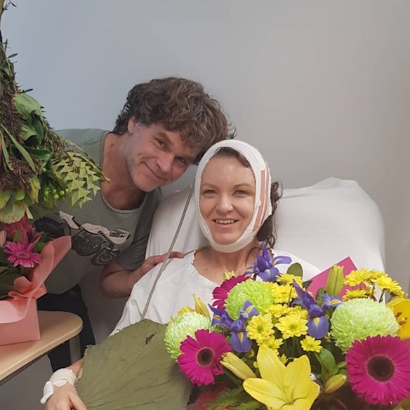Winberg, with husband Anders, recovering in hospital following her 2019 scalping accident.