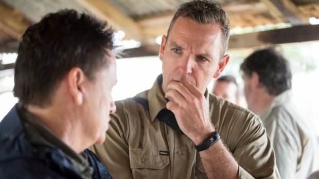Greening Australia chief executive Brendan Foran listens to wetlands expert Niall Connolly.