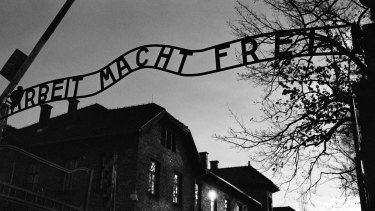 The main entrance at the former Nazi death camp of Auschwitz in Oswiecim, Poland, with the inscription, “Arbeit Macht Frei”, which translates into English as “Work sets you Free”.