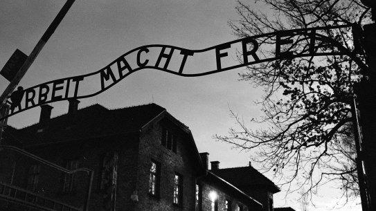 The main entrance at the former Nazi death camp of Auschwitz in Oswiecim, Poland, with the inscription, “Arbeit Macht Frei”, which translates into English as “Work sets you Free”.