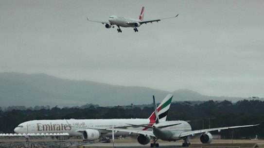 A Qanats jet prepares to land at Melbourne Airport.