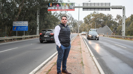 Commercial builder Scott Mann at the border on Monday. Border business owners have hit out at the Andrews government over their handling of the Victorian-NSW border closure.