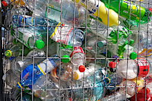 Different colored plastic bottles in bin