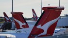 Qantas planes at Sydney’s domestic airport. Generic REX, Qantas, Virgin, Jetstar , airport, planes, passengers, commuters, airlines, travel, economy, transport, delays, luggage, customers. Sydney, NSW. August 7, 2024. Photo: Kate Geraghty