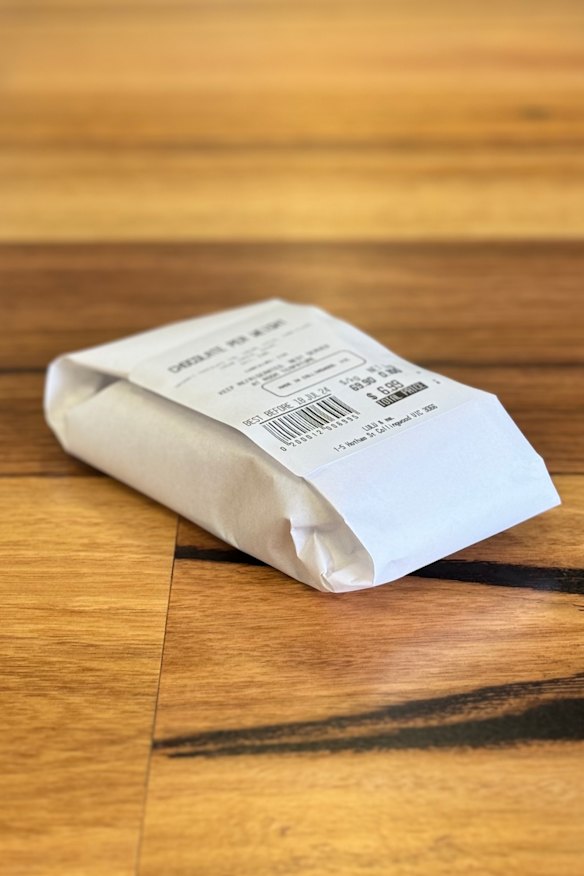 Cheesecake is weighed and packed before you pay.