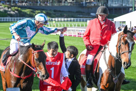 James McDonald returns to the mounting yard on Romantic Warrior after winning the Cox Plate.