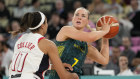Tess Madgen tries to find away past a US opponent.