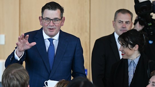 Daniel Andrews mingles with reporters as the state budget is released on Tuesday.