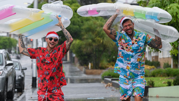 Can’t rain on our parade: Melburnians celebrate a soggy Christmas