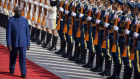 Solomon Islands Prime Minister Manasseh Sogavare reviews a Chinese honor guard during a welcome ceremony at the Great Hall of the People in Beijing in 2019.