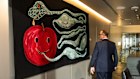 Glenn Morgan with Artwork on display at the Deutsche Bank. 