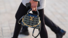 a black gray pattern Capucines Louis Vuitton bag, gold navy blue chain handle