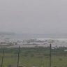 In this image taken from a video released by Geophysical Service of the Russian Academy of Sciences, shows the aftermath of tsunami hitting the coastal area of Severo-Kurilsk at Paramushir island of Kuril Islands, Russia, Wednesday, July 30, 2025. (Geophysical Service of the Russian Academy of Sciences via AP)