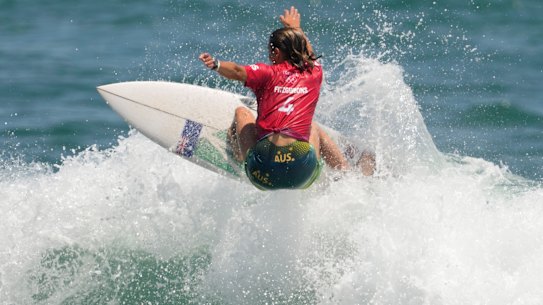 Australia’s Sally Fitzgibbons competes during the first round of the women’s surfing competition at the 2020 Summer Olympics at Tsurigasaki beach in Ichinomiya, Japan.