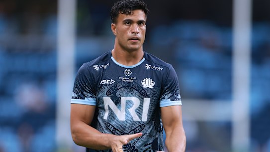 oseph-Aukuso Suaalii of the Waratahs warms up before the round one Super Rugby Pacific match between NSW Waratahs and Highlanders