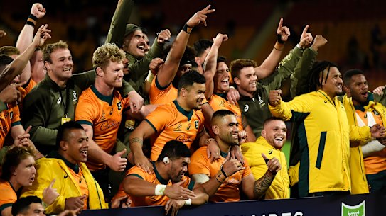The Wallabies celebrate.