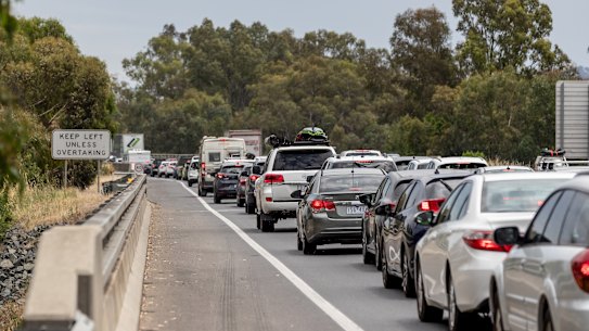 No end in sight: a queue of frustrated motorists snakes back into NSW from the border town of Albury.