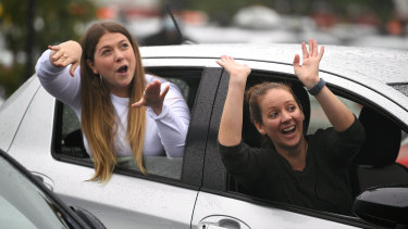 Guests watch on from their vehicles as Casey Donovan performs.