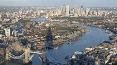 The Shard skyscraper casts a shadow as a tall ship sails down the River Thames towards an open Tower Bridge in London. The river is more than 300 kilometres long.
