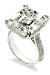 The 17.34 karat emerald cut diamond ring set in platinum which sold for $ 575,000.